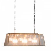 Lancaster Pendant Light This statement pendant light has room for three bulbs in the glear glass