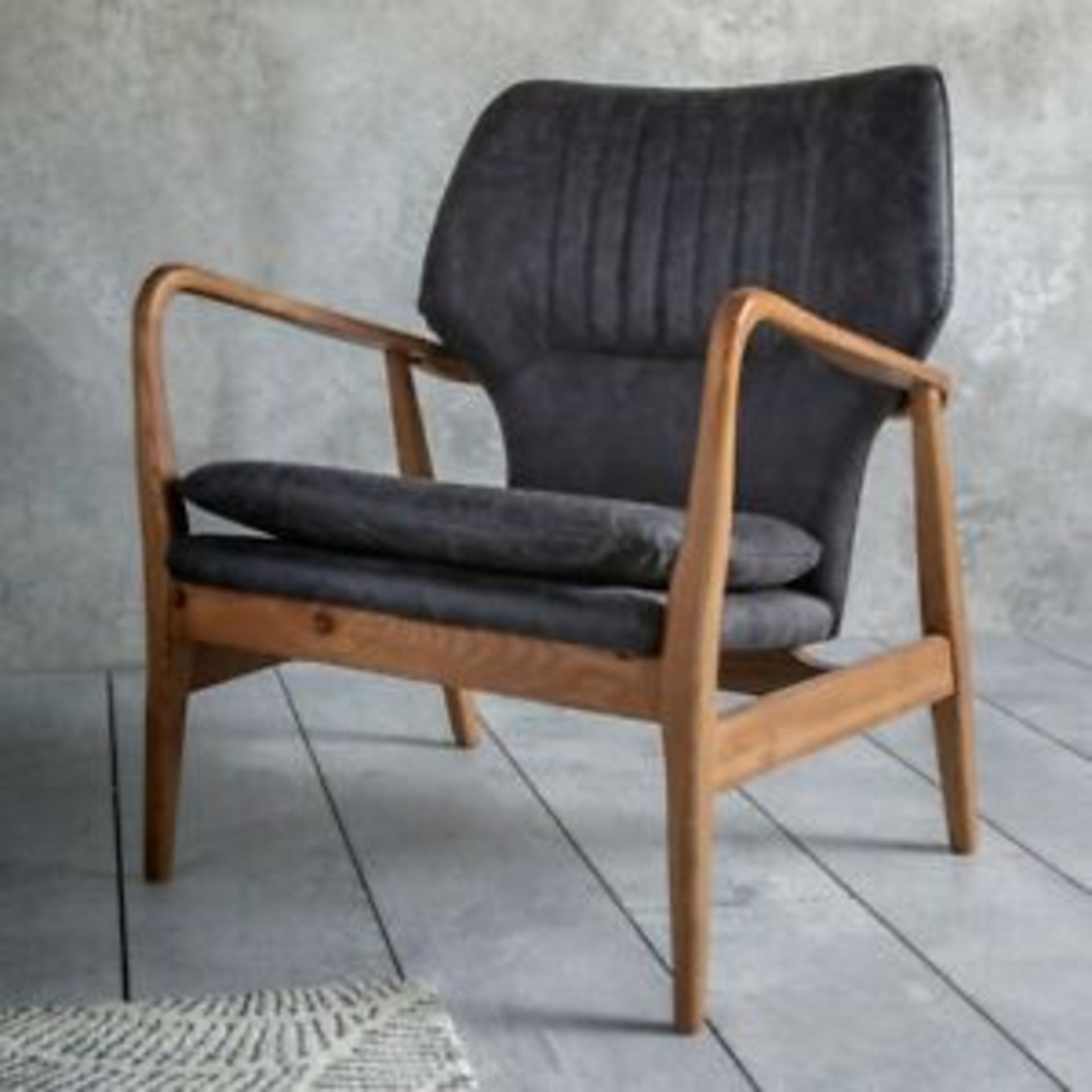 Whitworth Chair Charcoal Leather The beautiful curves and vintage-inspired design of the stunning