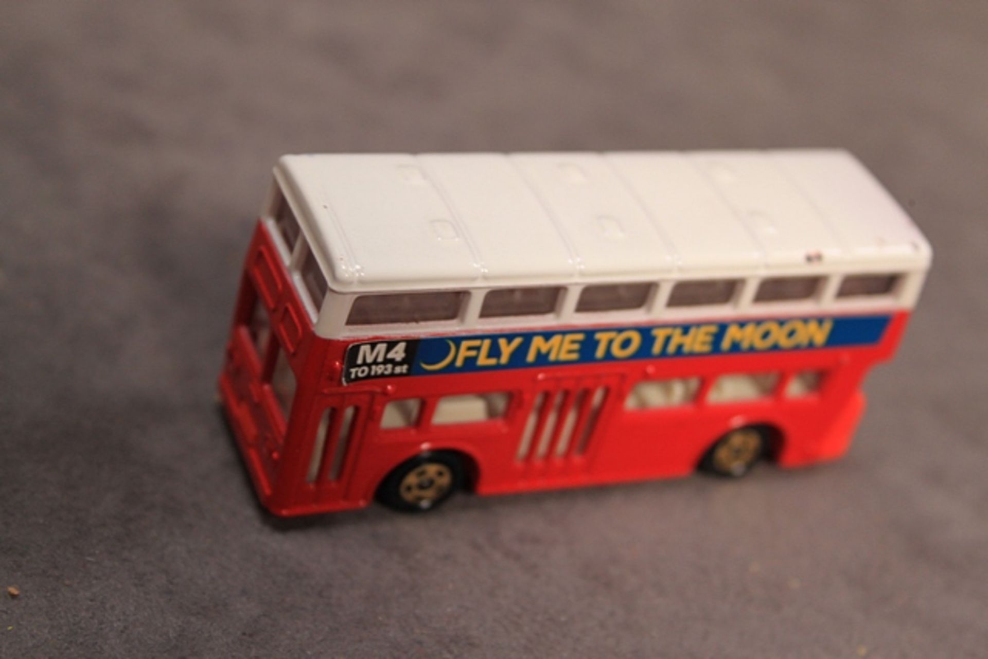 Mint Tomica diecast #F15 London Bus in Red & White with gold wheels (Fly me to the moon)with box