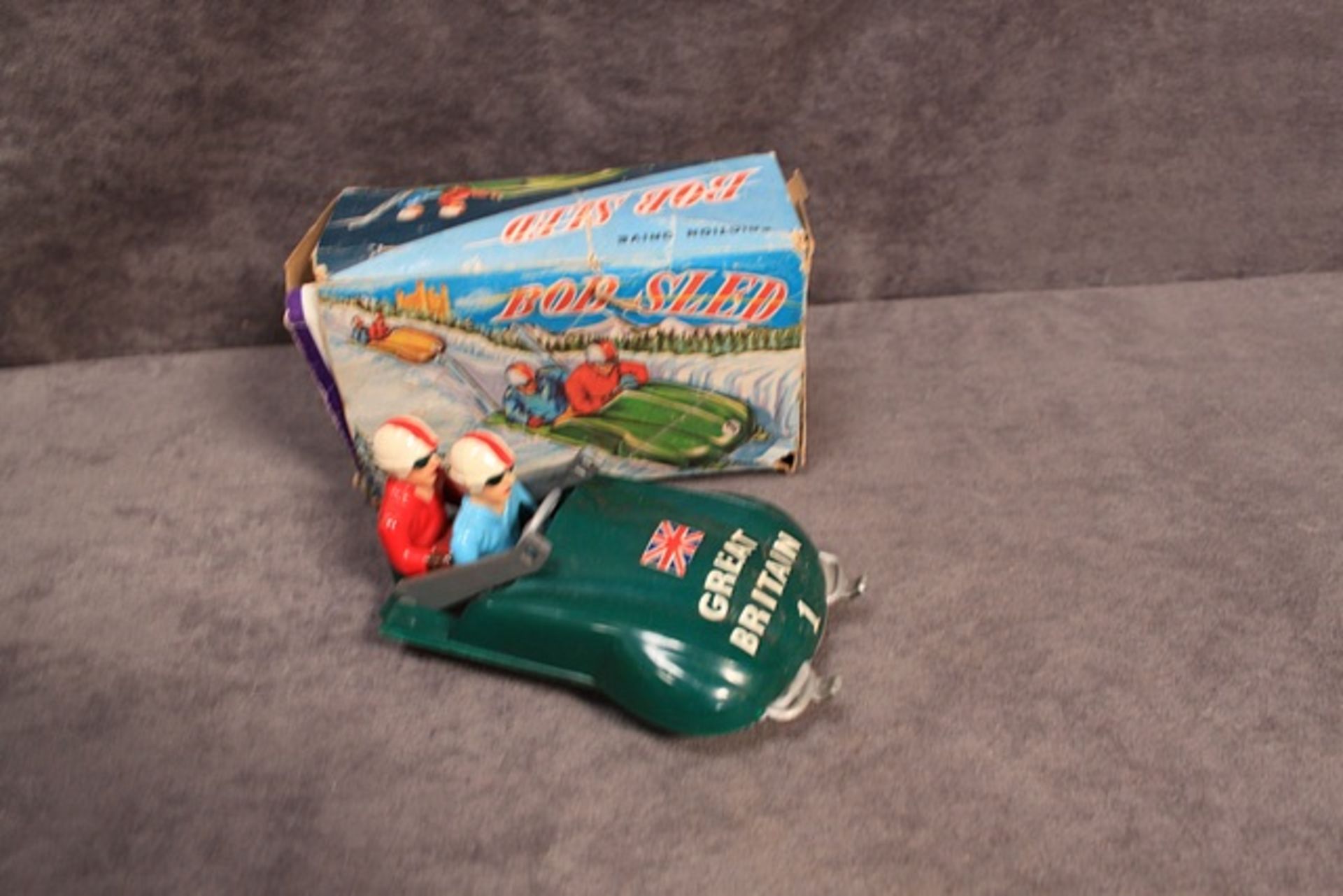 Quite Rare Bob Sled Friction Drive #54 made in Hong Kong in box (box is complete but damaged)