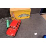 FERNGELENKTES ELEKTRO-SPIELZEUGAUTO. Plastic 'remote-control' model car. German. Circa 1965.