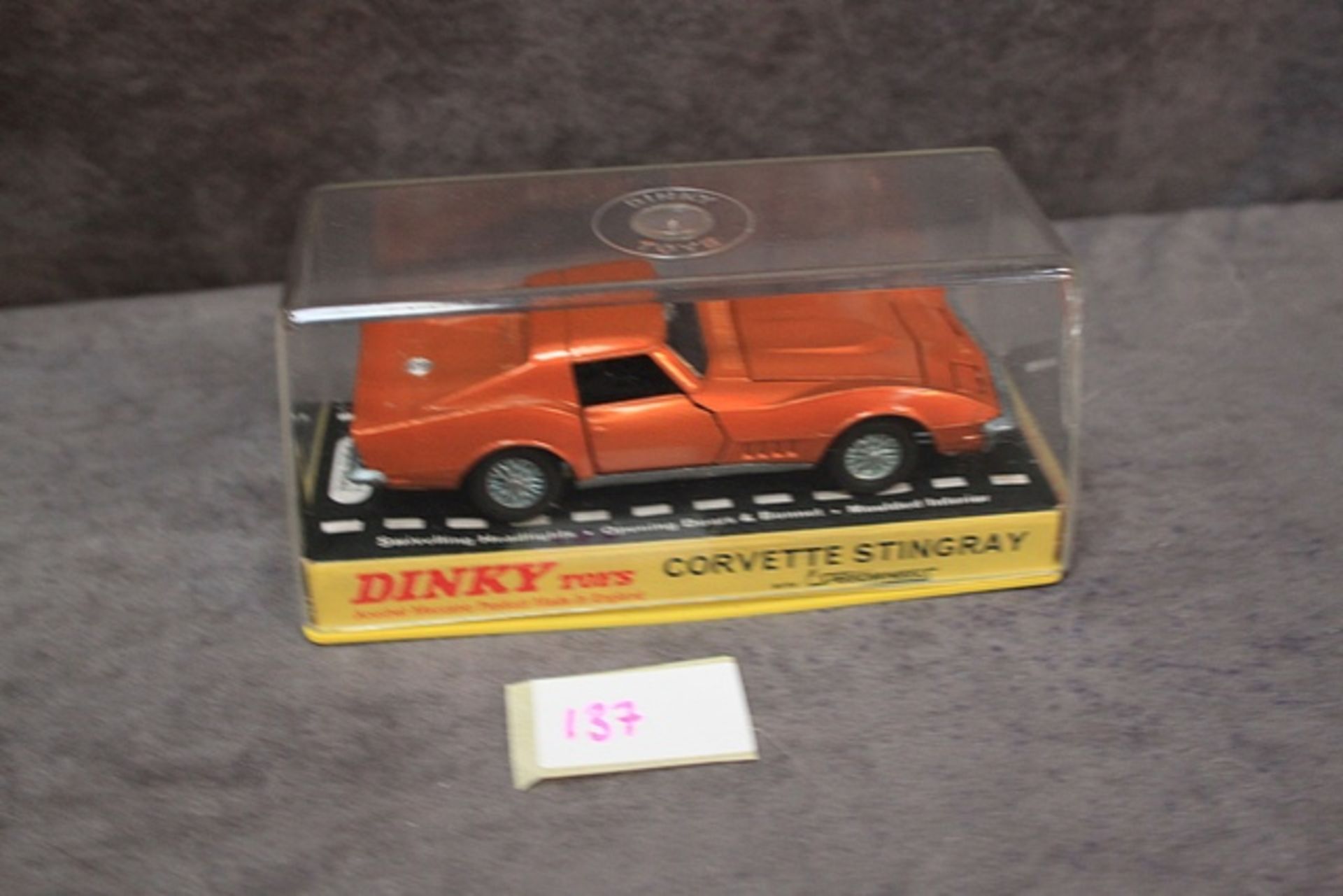 Mint Dinky Toys diecast #221 Corvette Stingray with painted headlights in excellent display box -