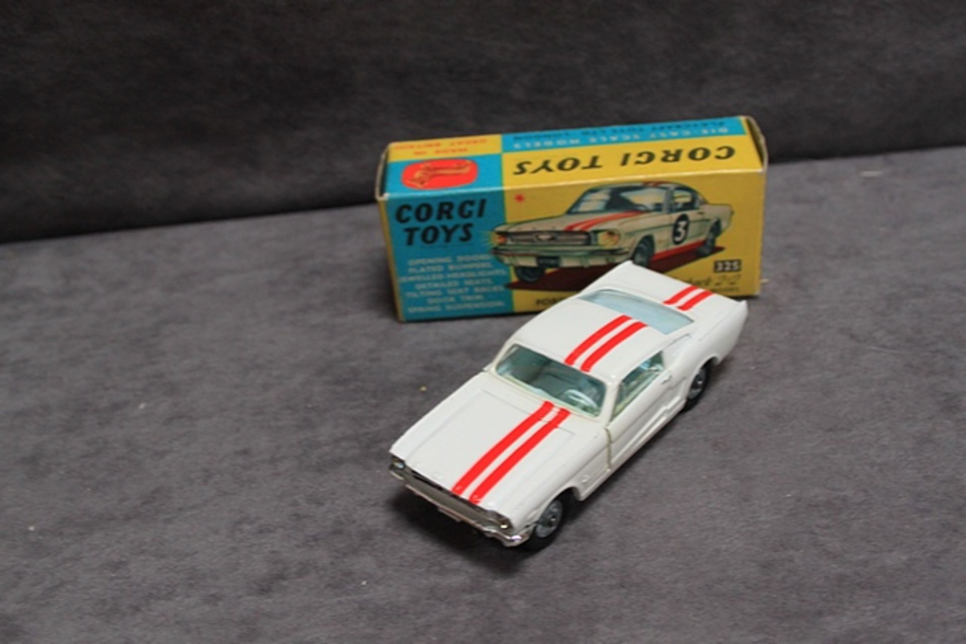 Mint Corgi Toys diecast #325 Ford Mustang fast back 2+2 in white with red stripes and leaflet in - Image 3 of 3