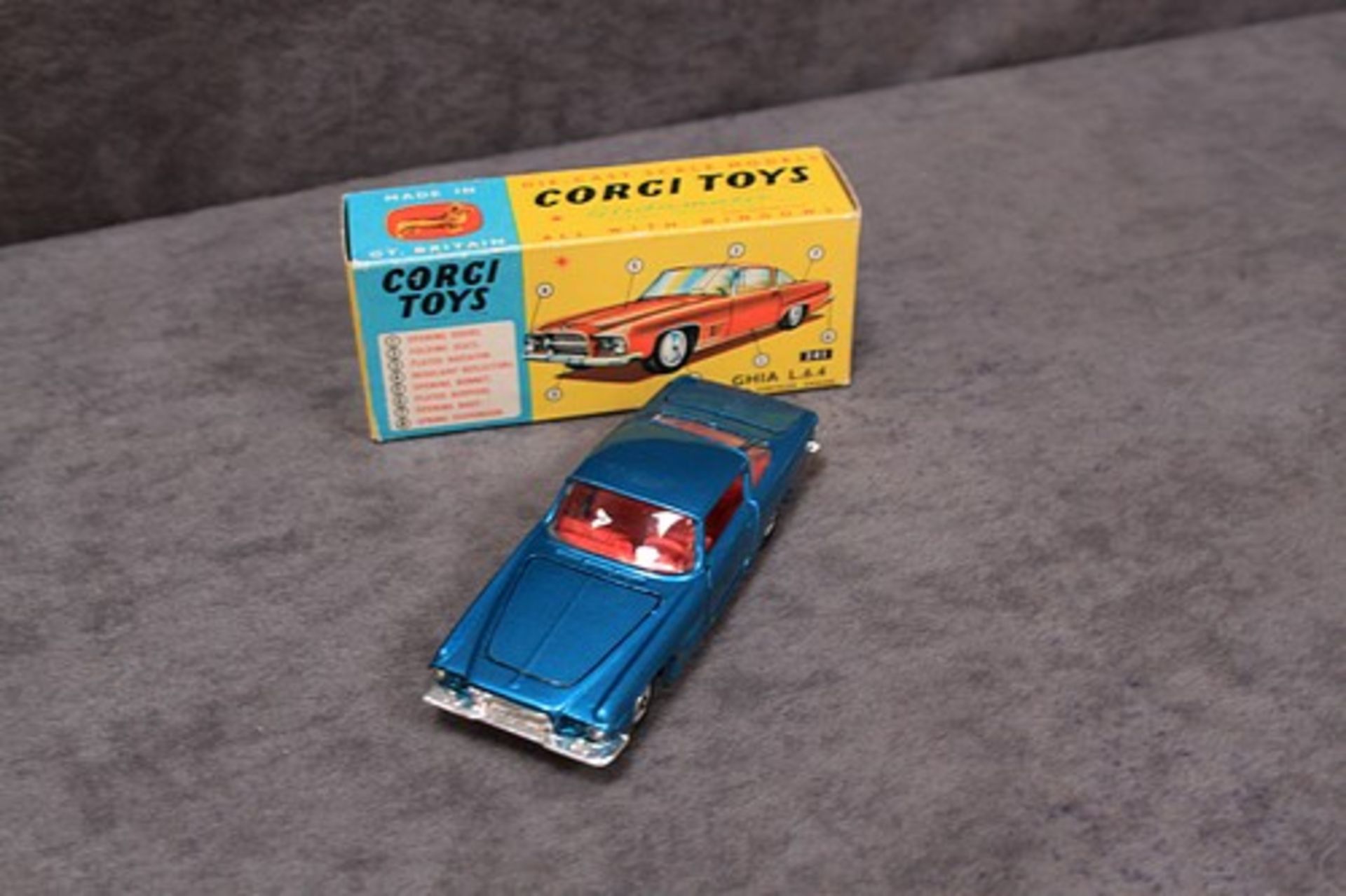 Mint Corgi Toys Diecast #241 Ghia L 6.4 in metallic blue with leaflet in a firm mint box