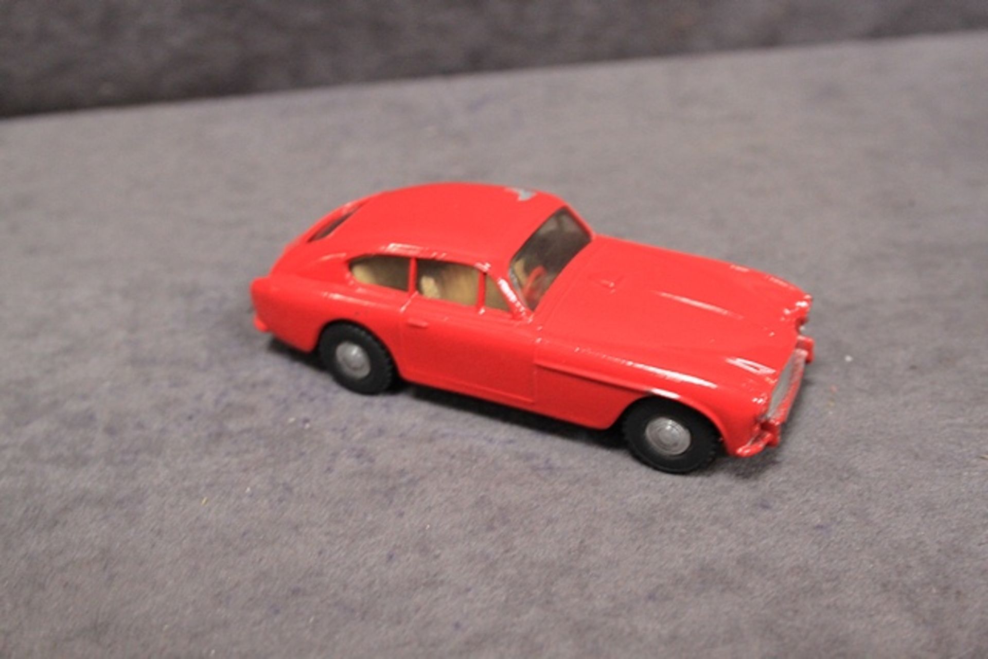 Triang Spot-On Aston Martin in red with leaflet in a poor box (flaps missing on both ends and tabs - Image 2 of 4