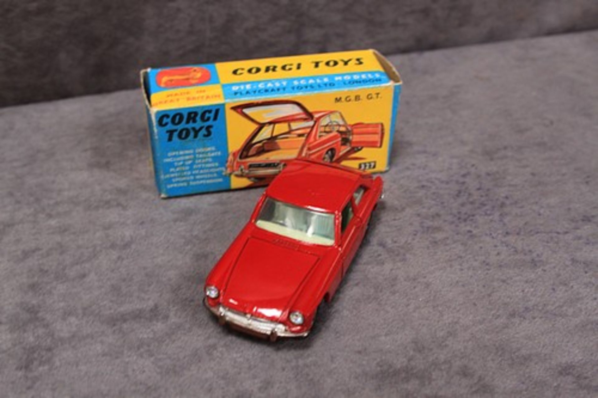 Corgi Toys Diecast #327 MGB GT in red with suitcase in a mint box