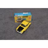 Mint Corgi Toys Diecast #345 MGC GT Competition Model in Yellow & Blackwith suitcase in a very good