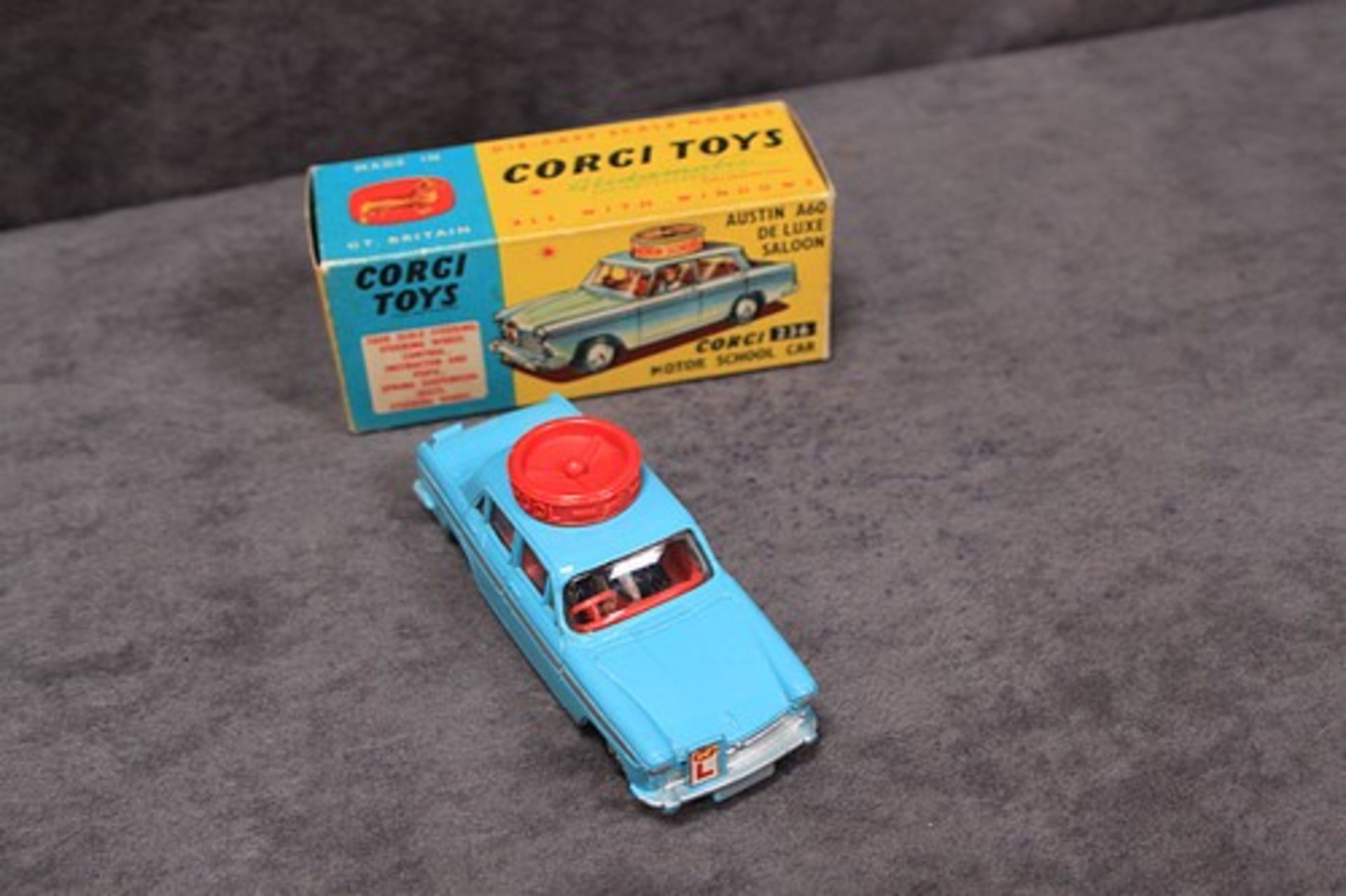 Mint Corgi Toys Diecast #236 Austin A60 De Luxe Saloon Corgi Motor School car in light blue with