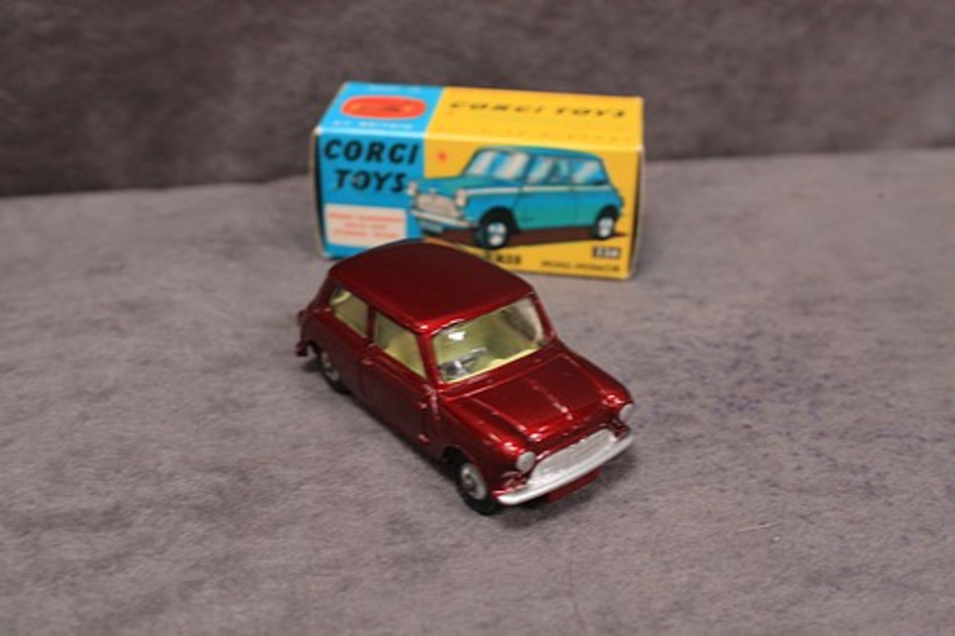 Mint Corgi Toys Diecast #226 Morris Minor in burgundy with leaflet in a mint box