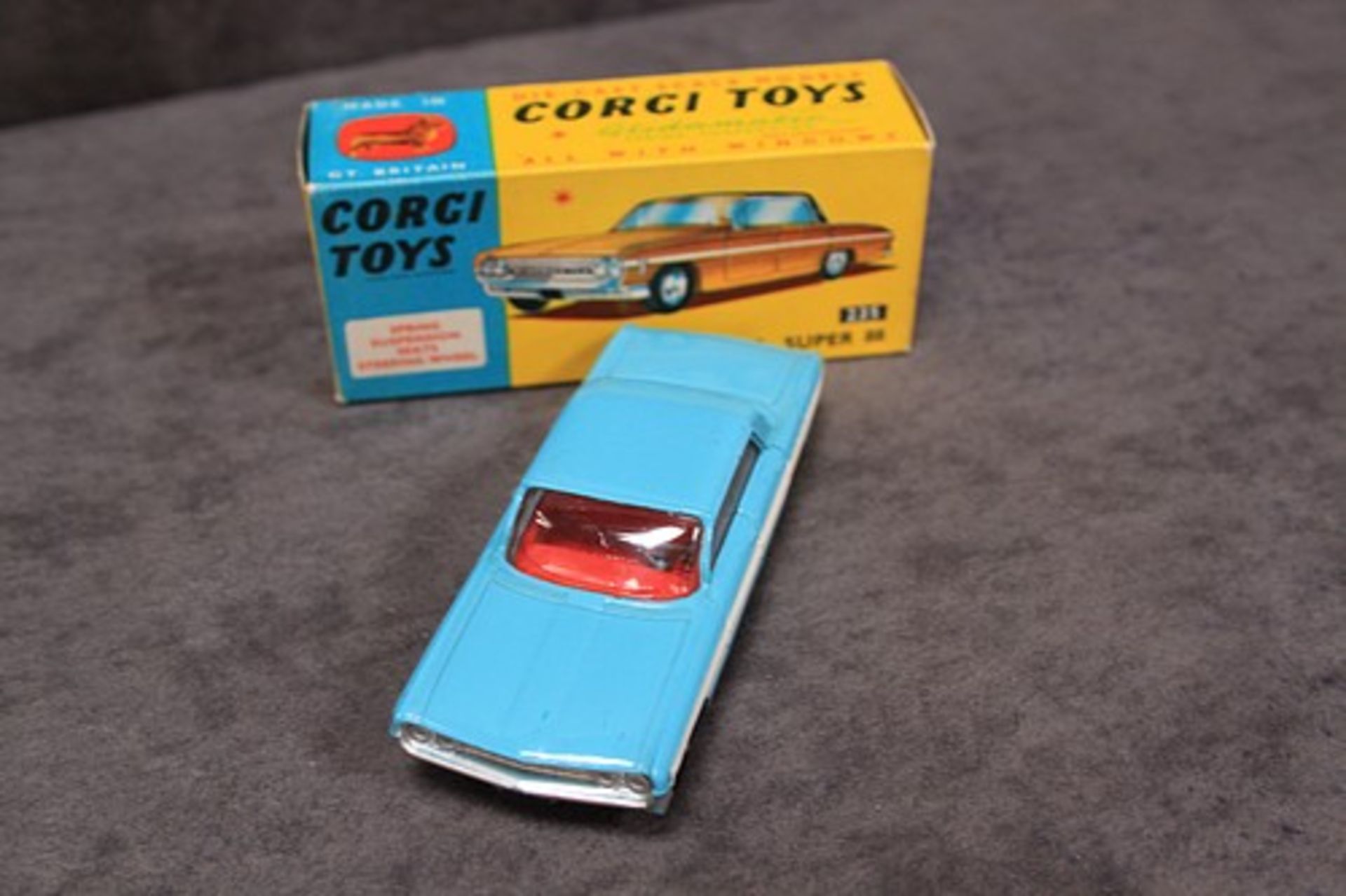 Mint Corgi Toys Diecast #235 Oldsmobile Super 88 rarer in light blue with white strip with leaflet