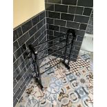 A Pair Of Black Wooden Free Standing Towel Holders