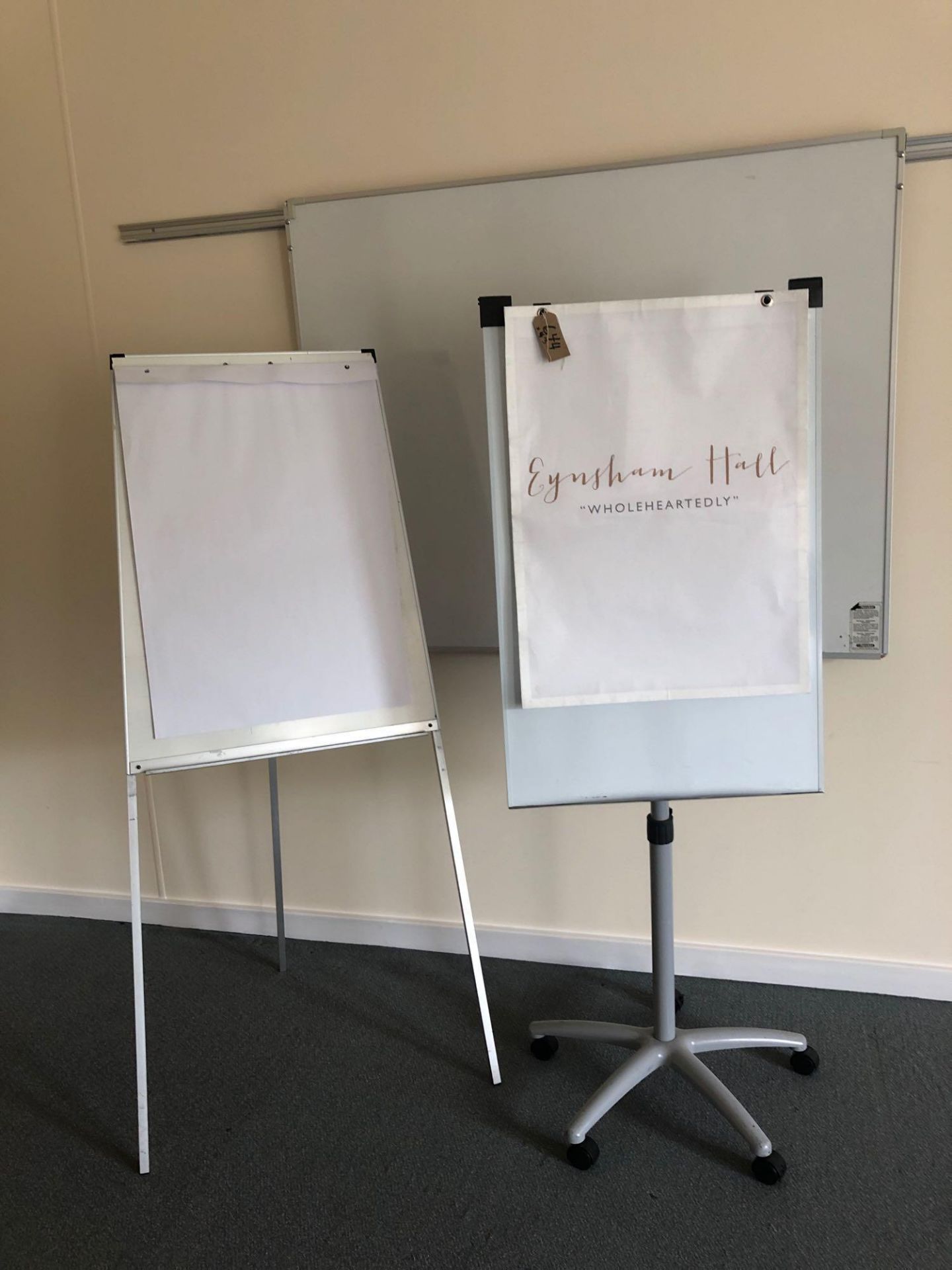 2 x Whiteboard/Flip Chart Stands Both Adjustable One On Wheels And One Wall Mounted White Board