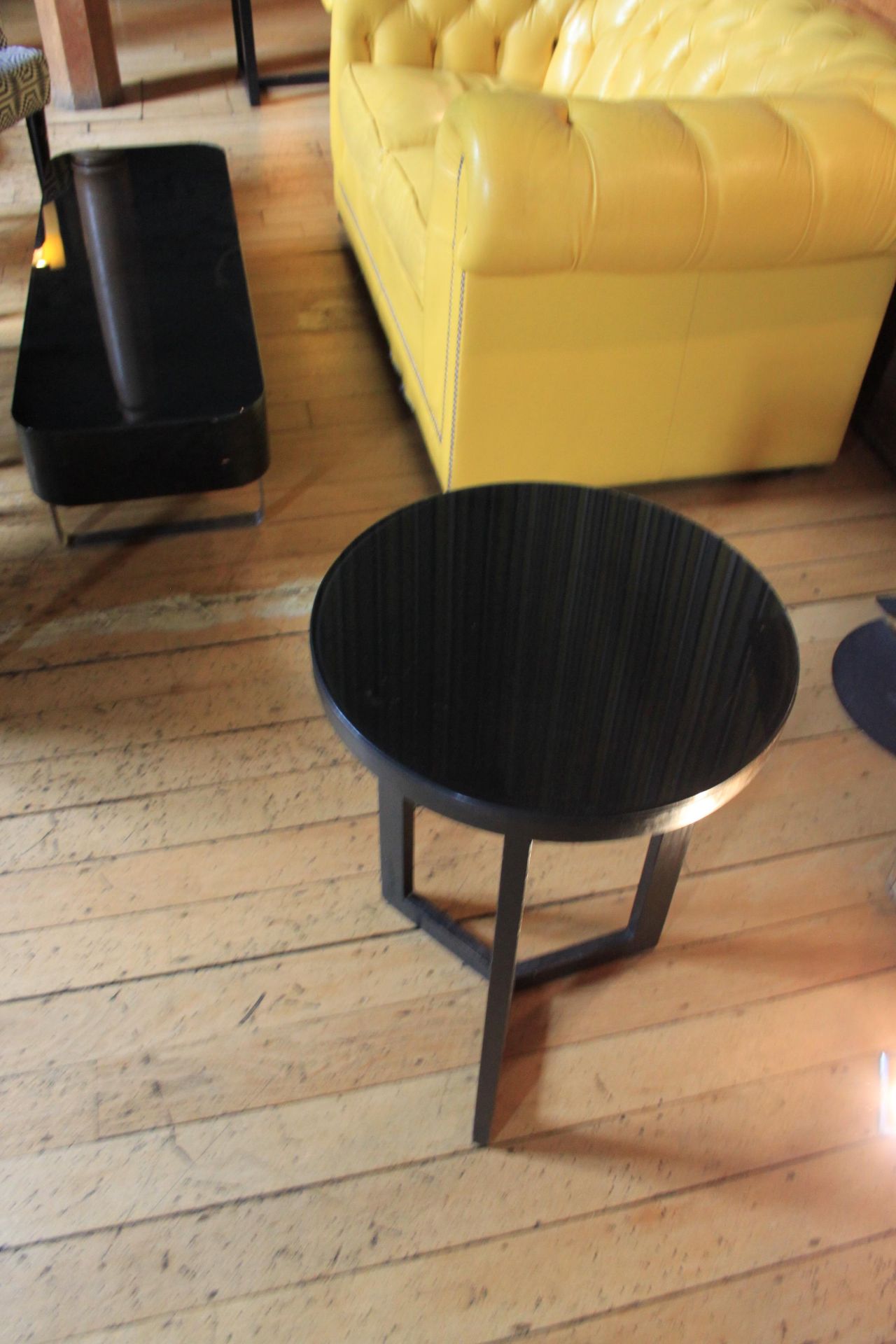 A Pair Of Black Wooden Round Side Tables With Glass Top 400 x 600mm