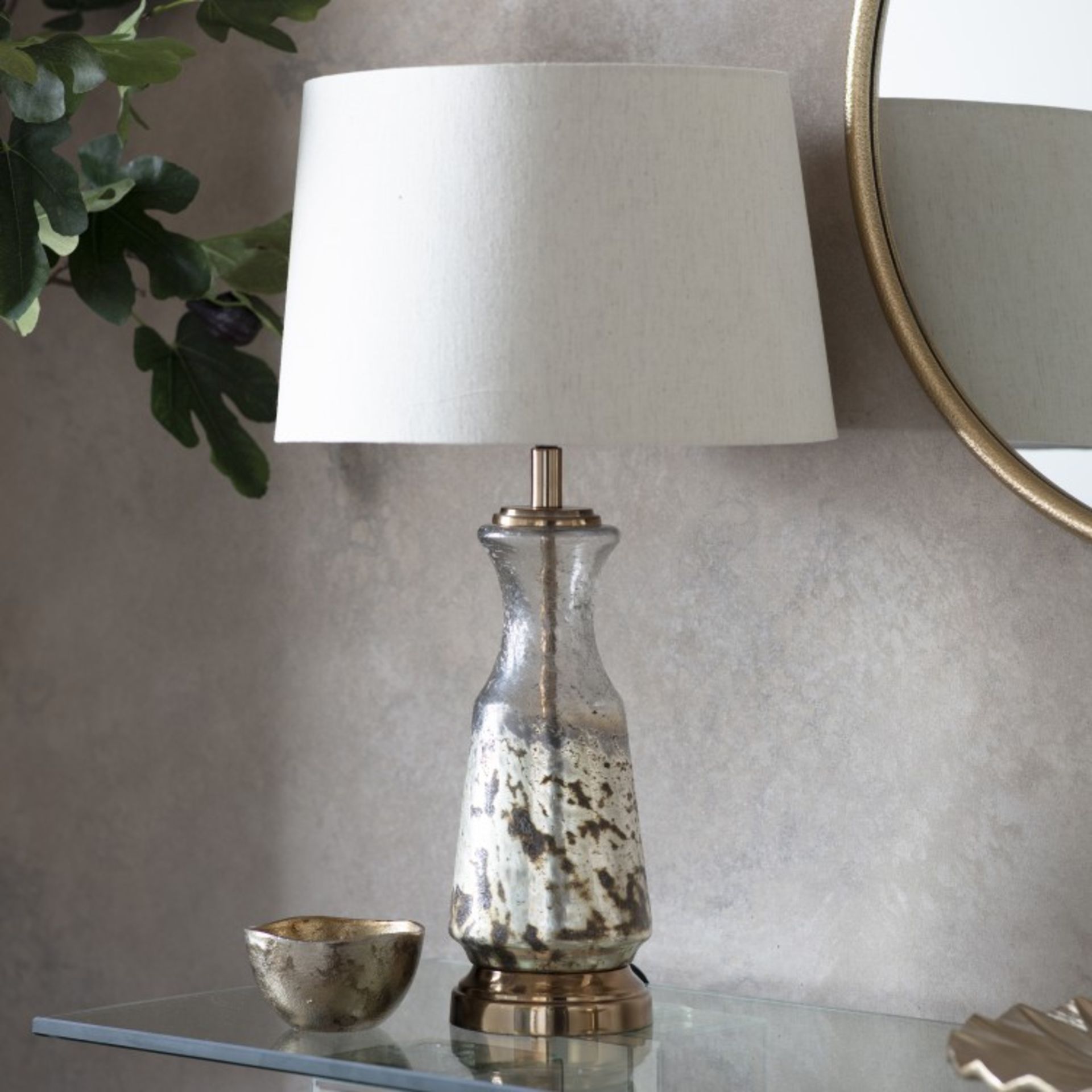 Odyssey Table Lamp Light up any surface with our new table lamps. When turned off, a table lamp