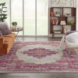 Ivory and Fuchsia Passion Rug Imaginative flowers in lush and saturated pigments grace this