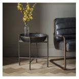 Wesley Side Table This unusual side table features a metal cross bar stand that holds a deep