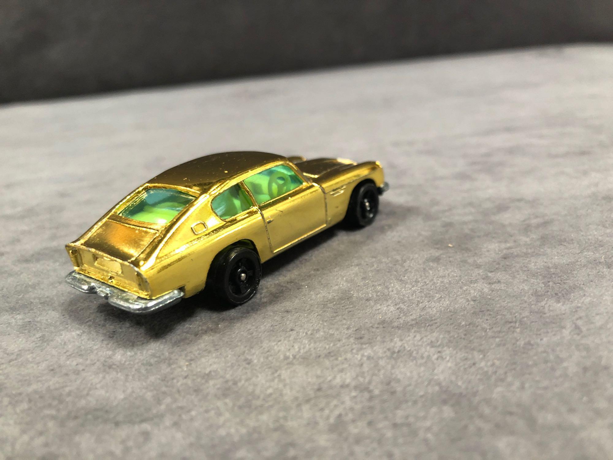 Mint Corgi Rockets Diecast #D901 Aston Martin DB6 In Metallic Gold With Yellow Interior In 'Code - Image 3 of 3