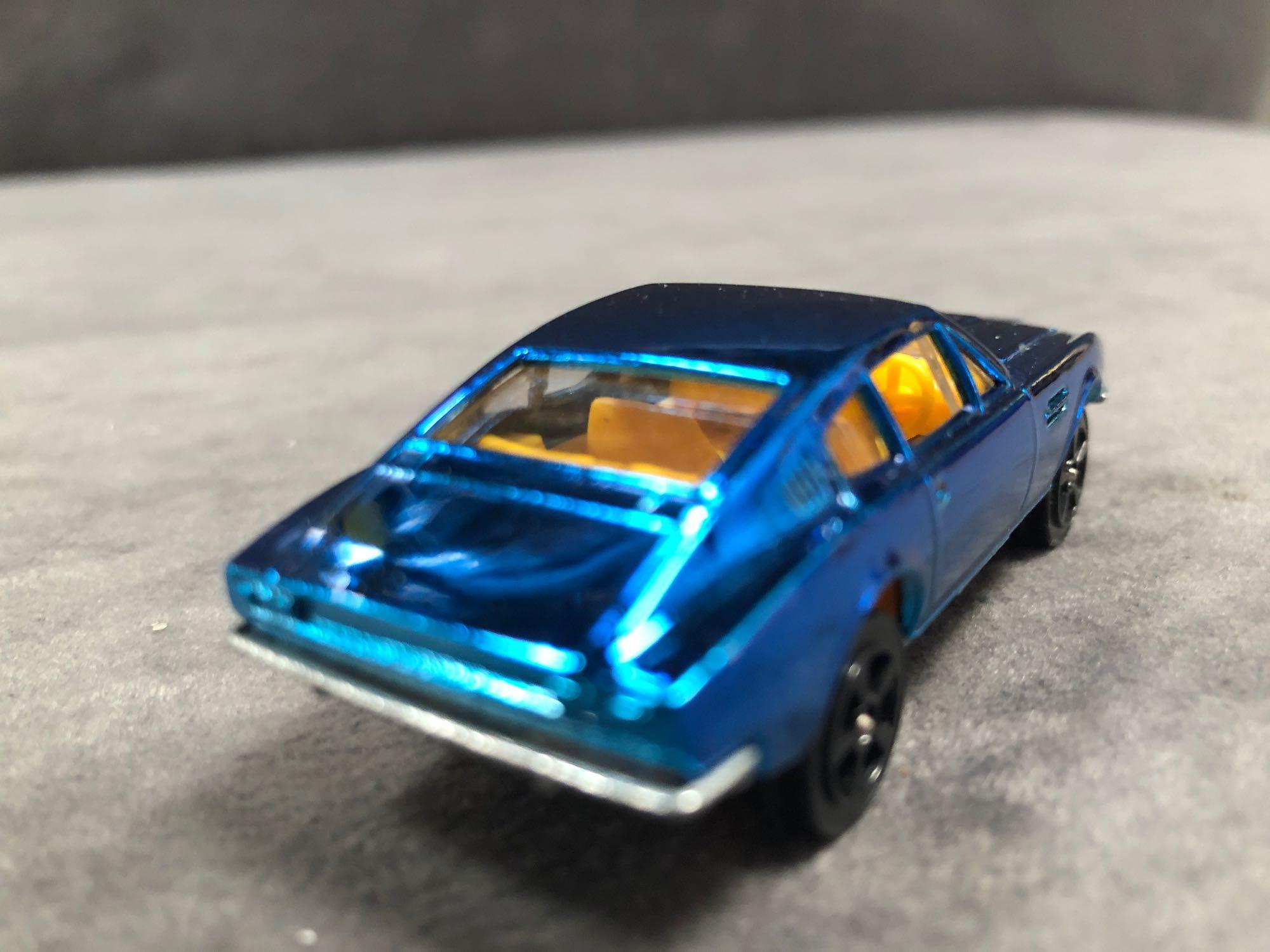 Mint Corgi Rockets Diecast #913 Aston Martin DBS In Metallic Blue With Orange Interior In 'Code 2' - Image 3 of 3