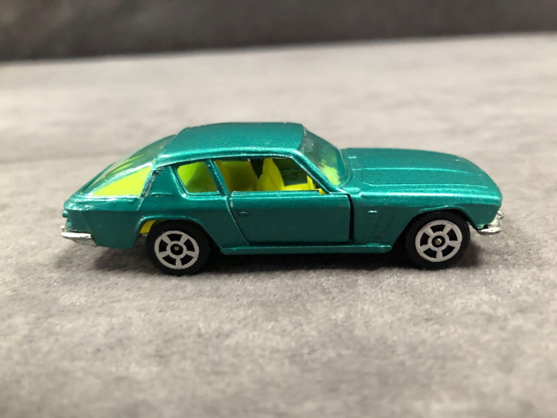 Mint Rarer Colour Corgi Whizzwheels Diecast #46 Jensen Interceptor In Metallic Green With Yellow - Image 2 of 3