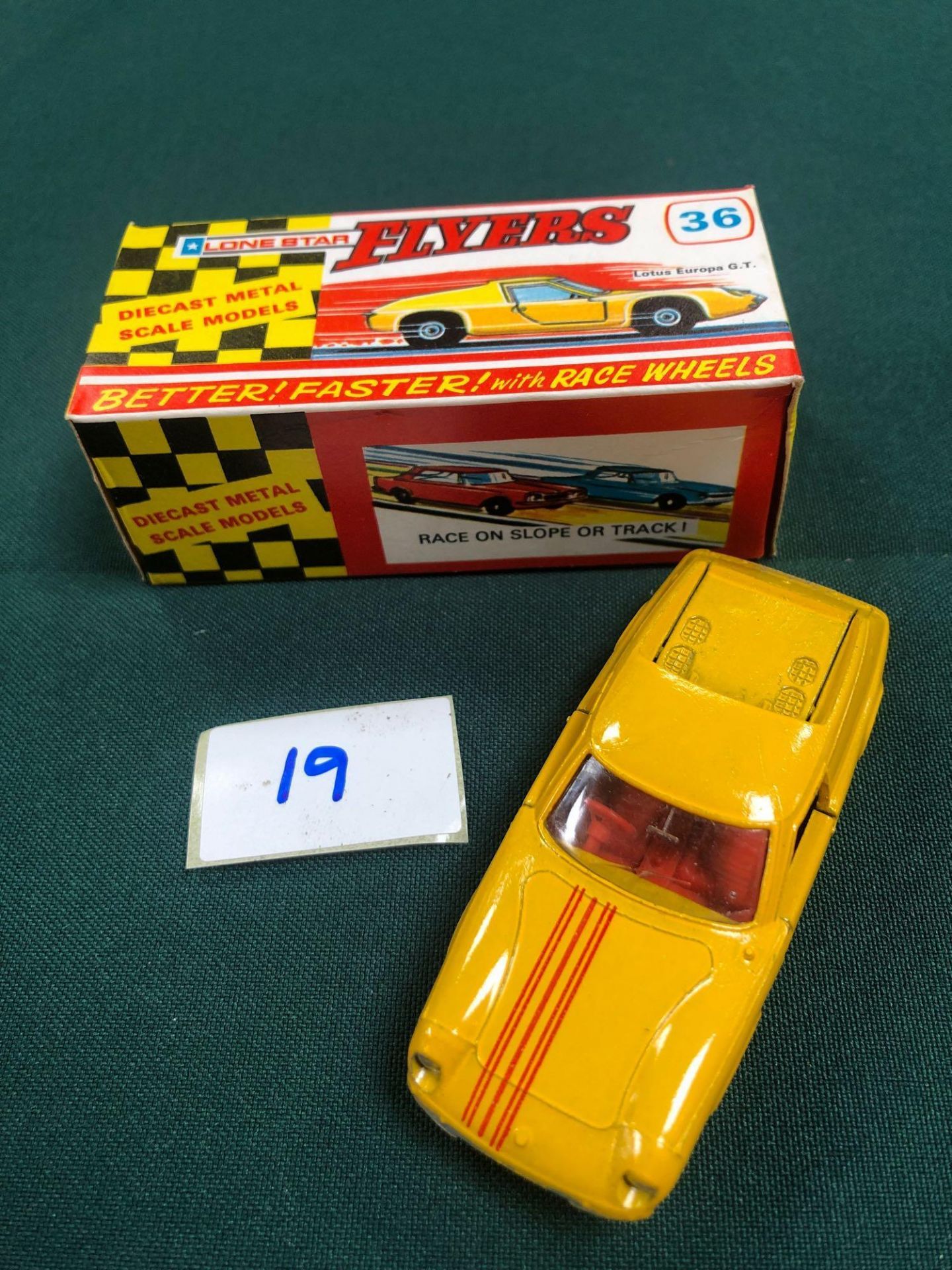 Lone Star Flyers Diecast Model #36 Lotus Europa GT In Yellow With Red Stripe And Red Interior In