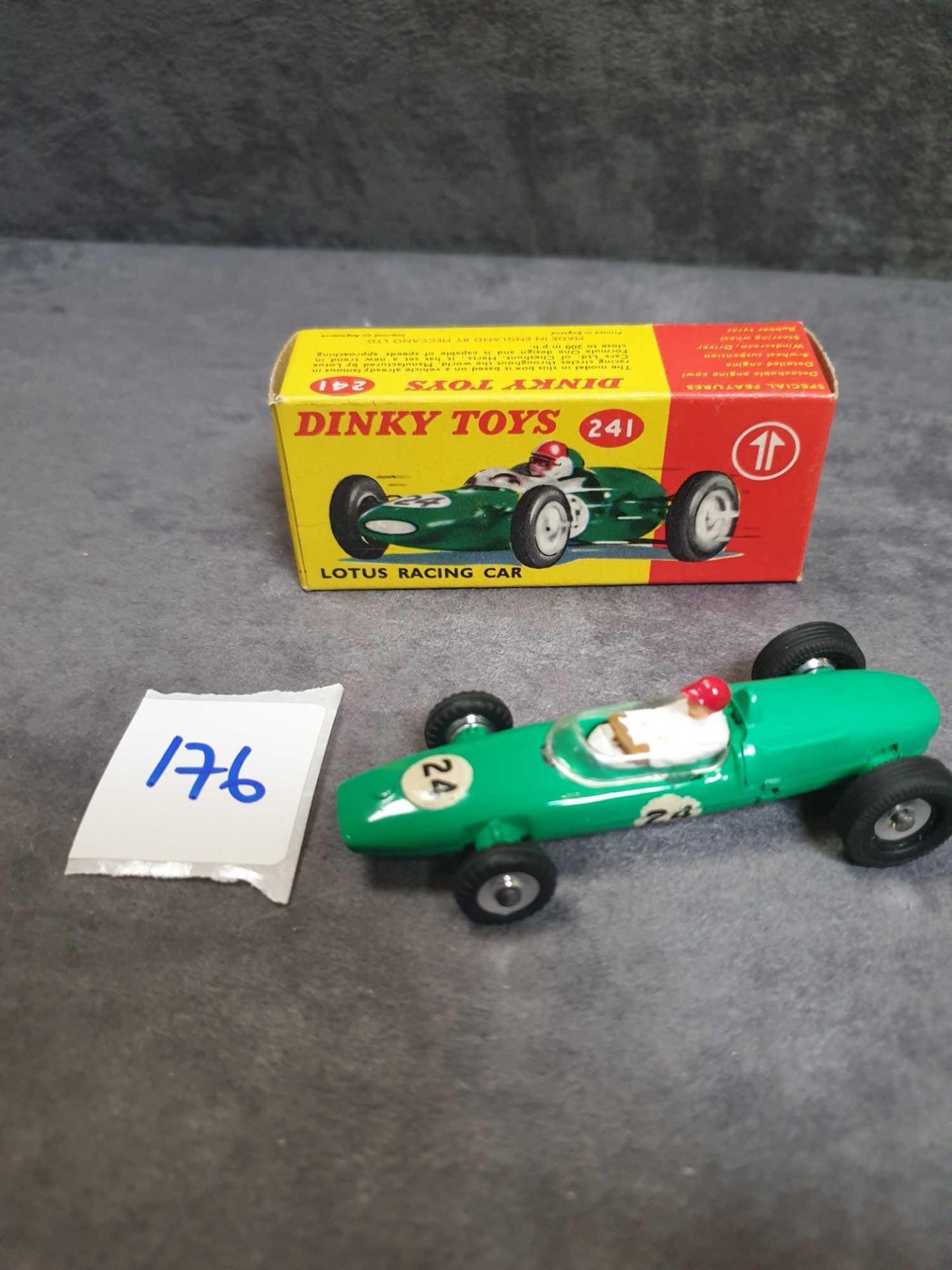 Mint Dinky Diecast #241 Lotus racing car green White driver with red helmet. RN #24 in a firm