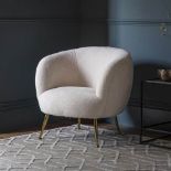 Ewano Tub Chair Faux Sheepskin With its curvilinear form, the Ewano chair is a perfect stand out