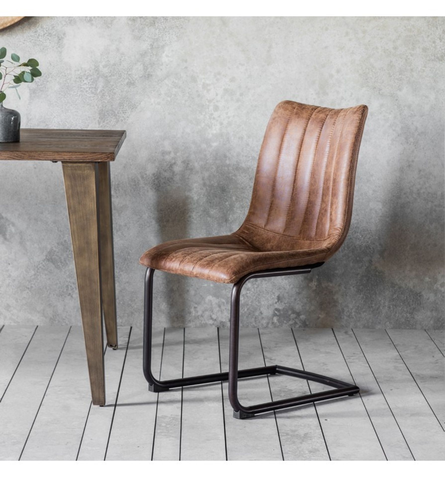 Edington Brown Chair (2pk) A retro classic styled dining chair with decorative stitching detail