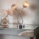 Aerith Table Lamp The Aerith collection features smokey mirror effect glass with wire mesh to create