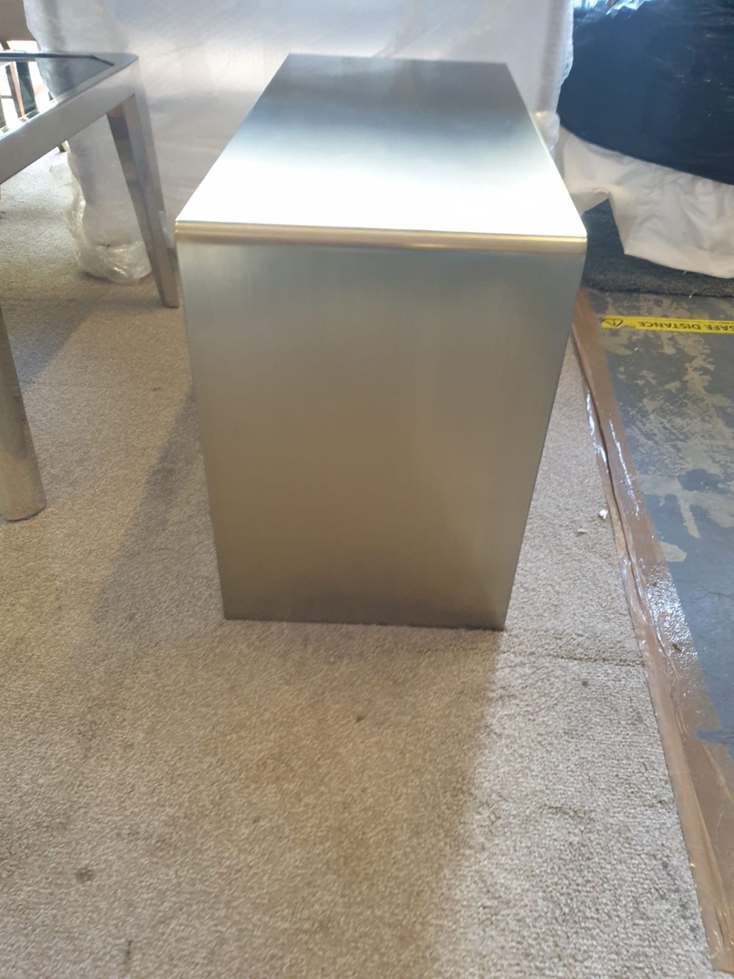 A brushed steel waterfall single piece side table constructed of solid stainless steel in brushed - Image 2 of 2