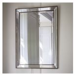 Ashkirk Mirror A stylish design, this Ashkirk range has a glass on glass style with a bronze