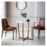 Cleo Round Dining Table Marble A contemporary round dining table featuring Spanish volkas marble