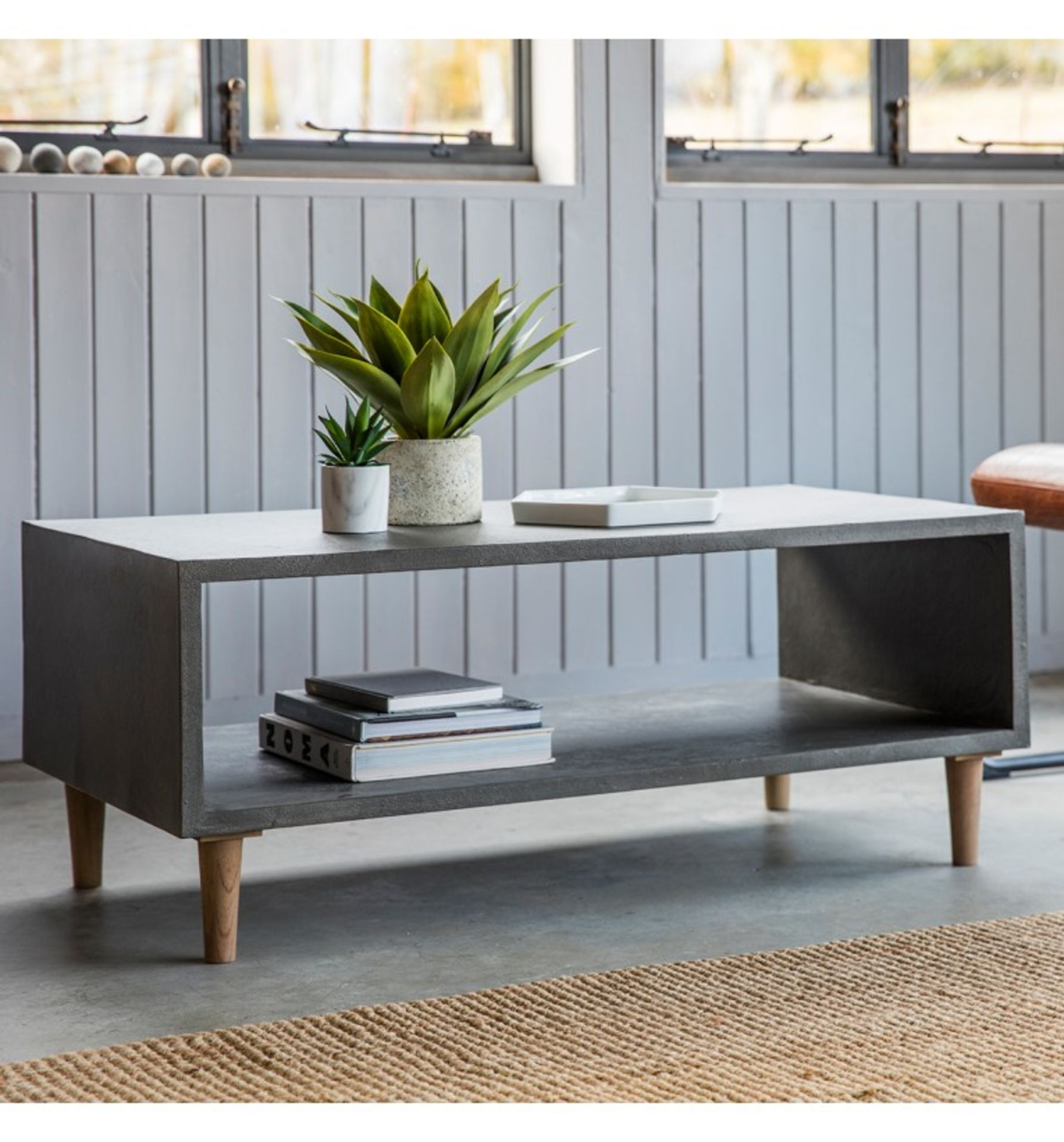 Bergen Cube Coffee Table The Bergen cubed coffee table has a modern meets industrial design in a