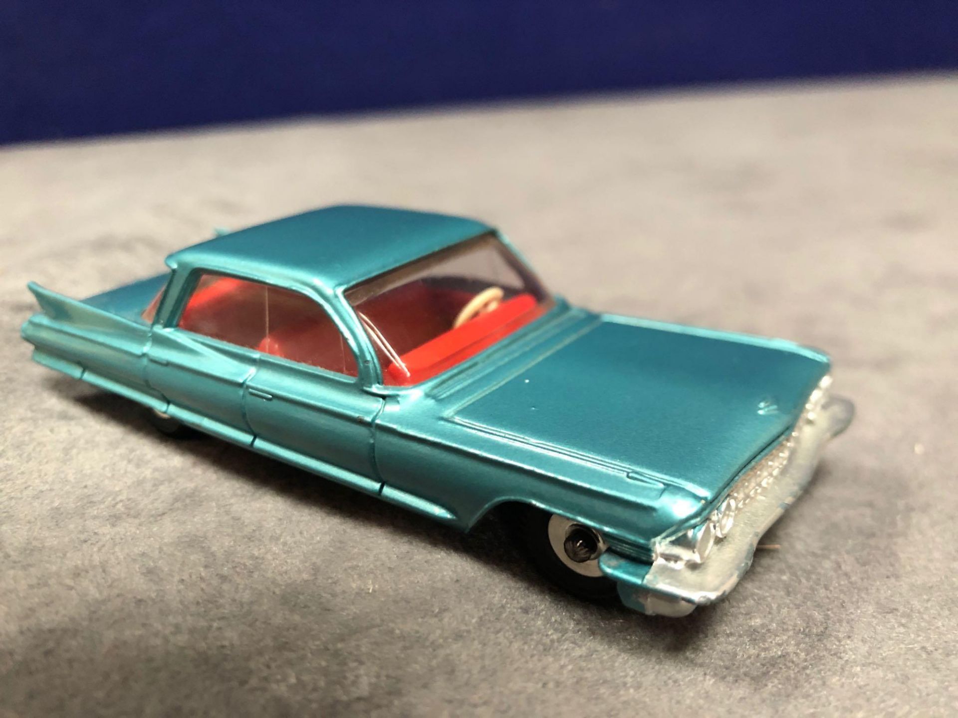 Dinky #147 Cadillac 62 Metallic Green - Red Interior And Spun Hubs 1962-1969. Unboxed mint lovely