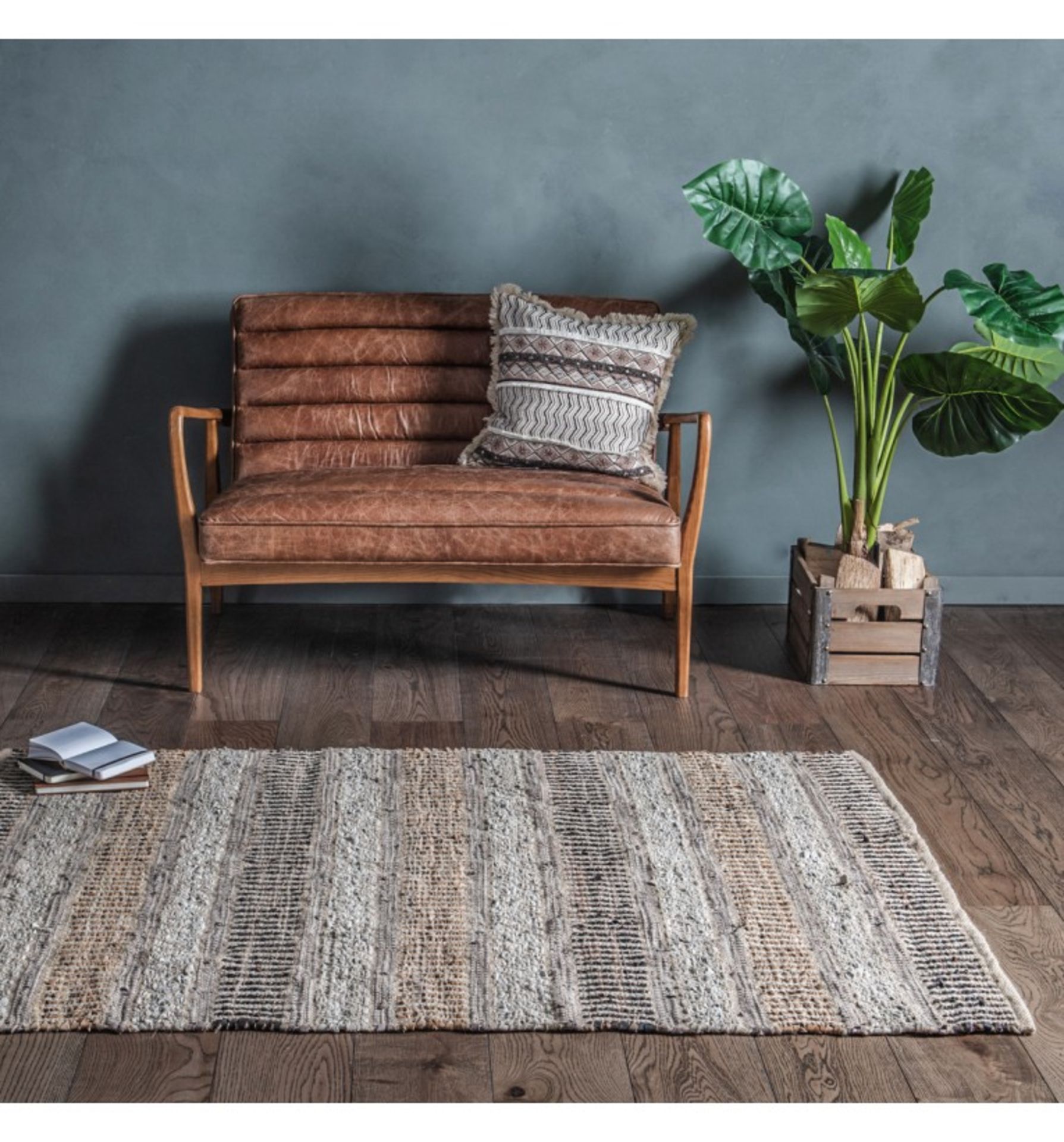Rojas Leather Rug Chocolate Add some texture to your interior with this striped handloomed leather