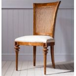 A Pair Of Spire Cane Back Side Chairs