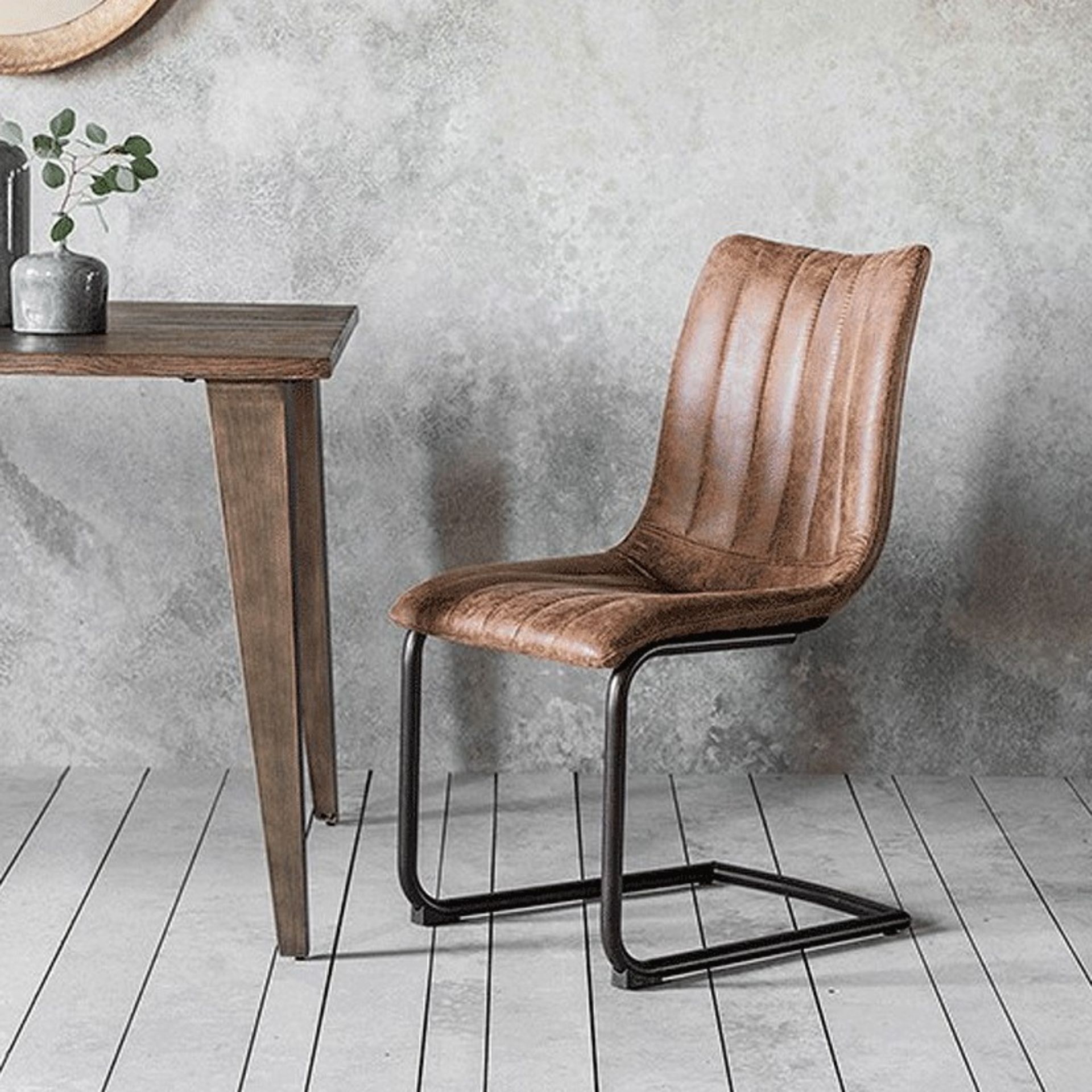 Edington Brown Chair (2pk) A retro classic styled dining chair with decorative stitching detail