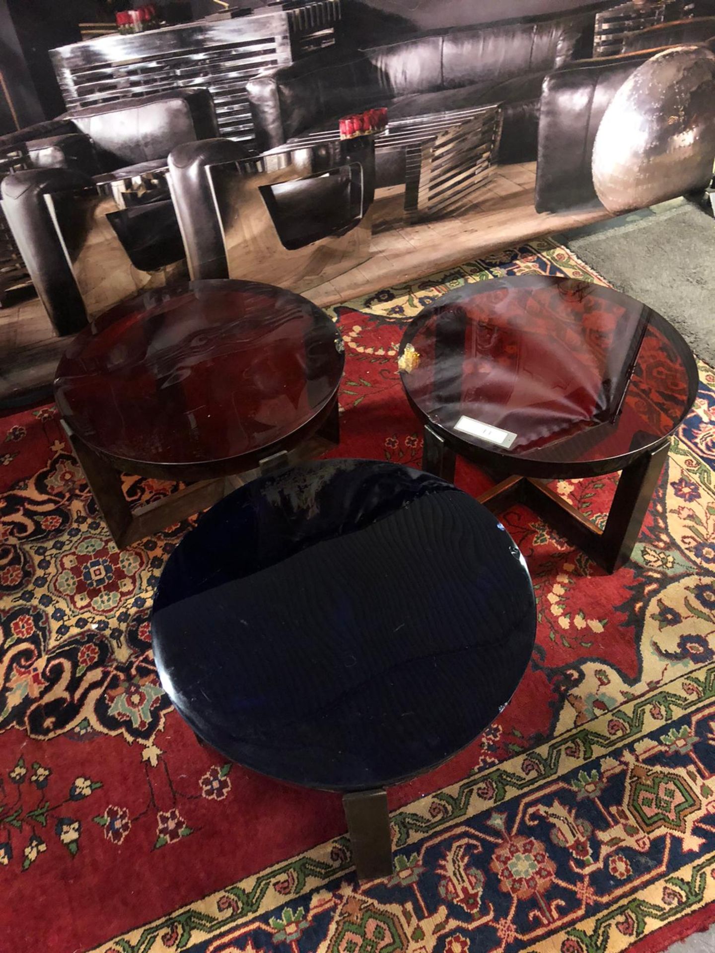 3 x small coloured glass tables with cast metal base. (heavily chipped)