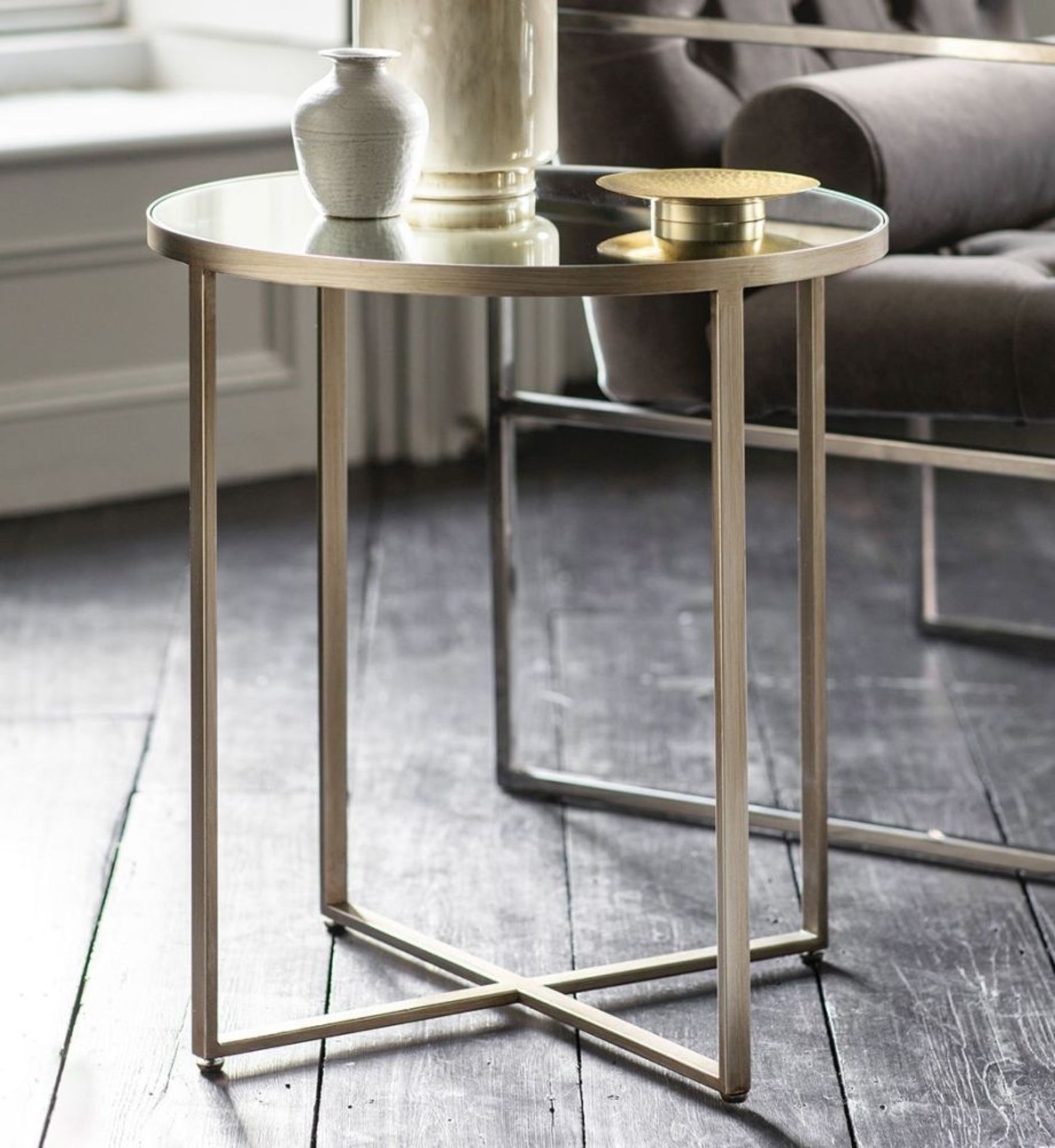 Torrance Side Table Silver The additions to the success of the Torrance coffee and side table are