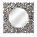 Baroque Silver Wall Mirror Exuberantly carved into an italian baroque style mirror in a sleek