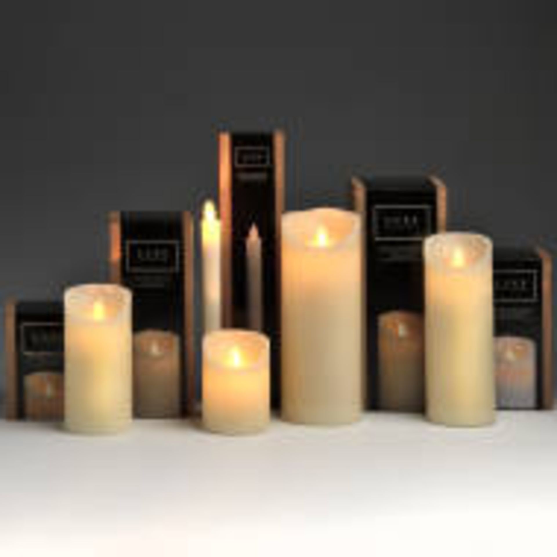 2 x Luxe Collection 3 x 4 Cream Flickering Flame LED Wax Candle This real wax battery operated