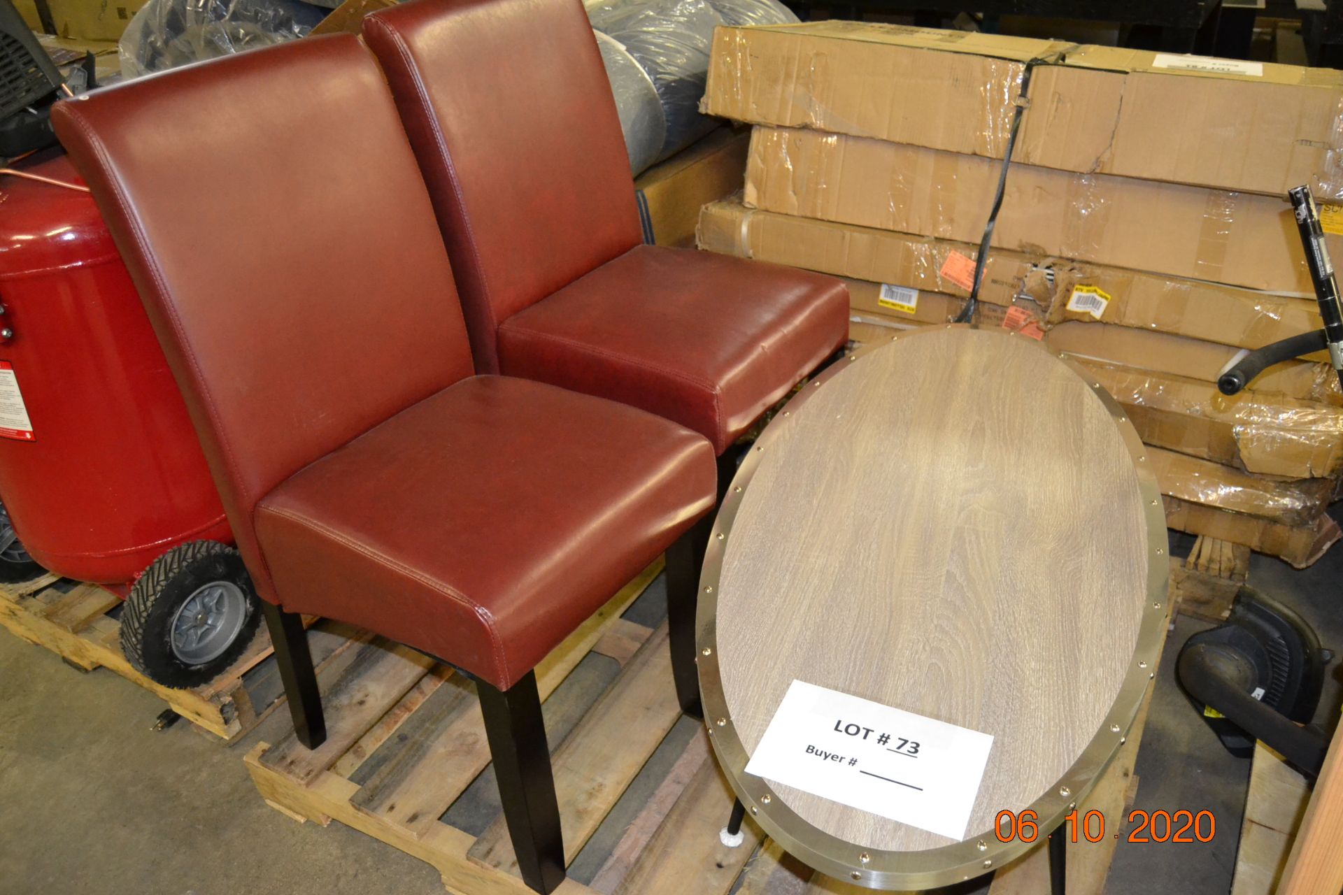 (2) PADDED LEATHER CHAIRS/OVAL COFFEE TABLE