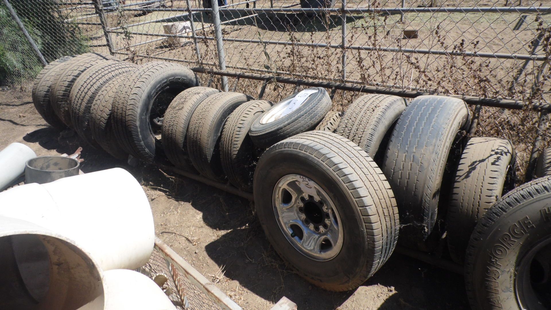 ASSORTED TIRES w/ RACK ( QTY 30 )