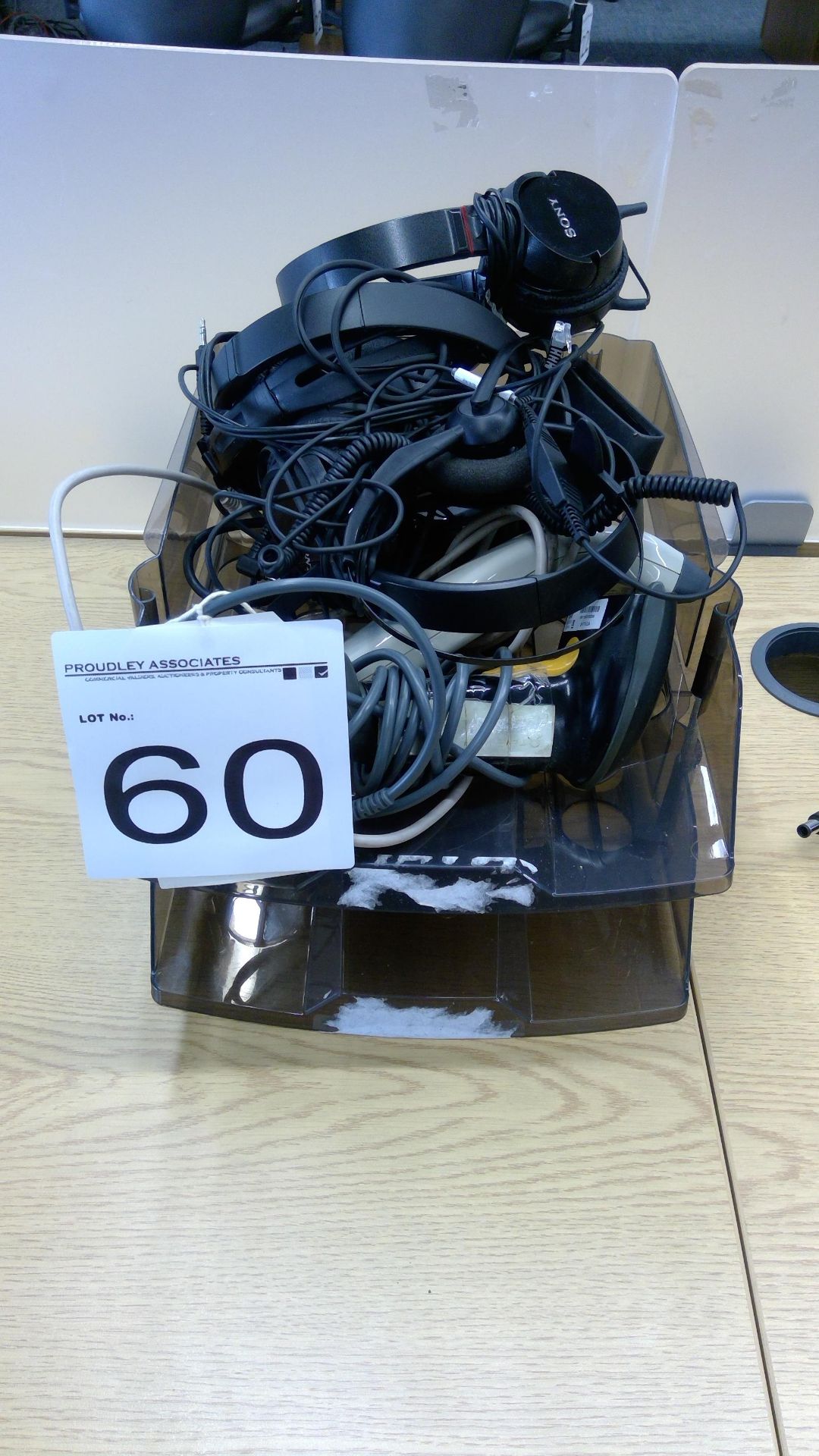 Assorted barcode scanners and headsets