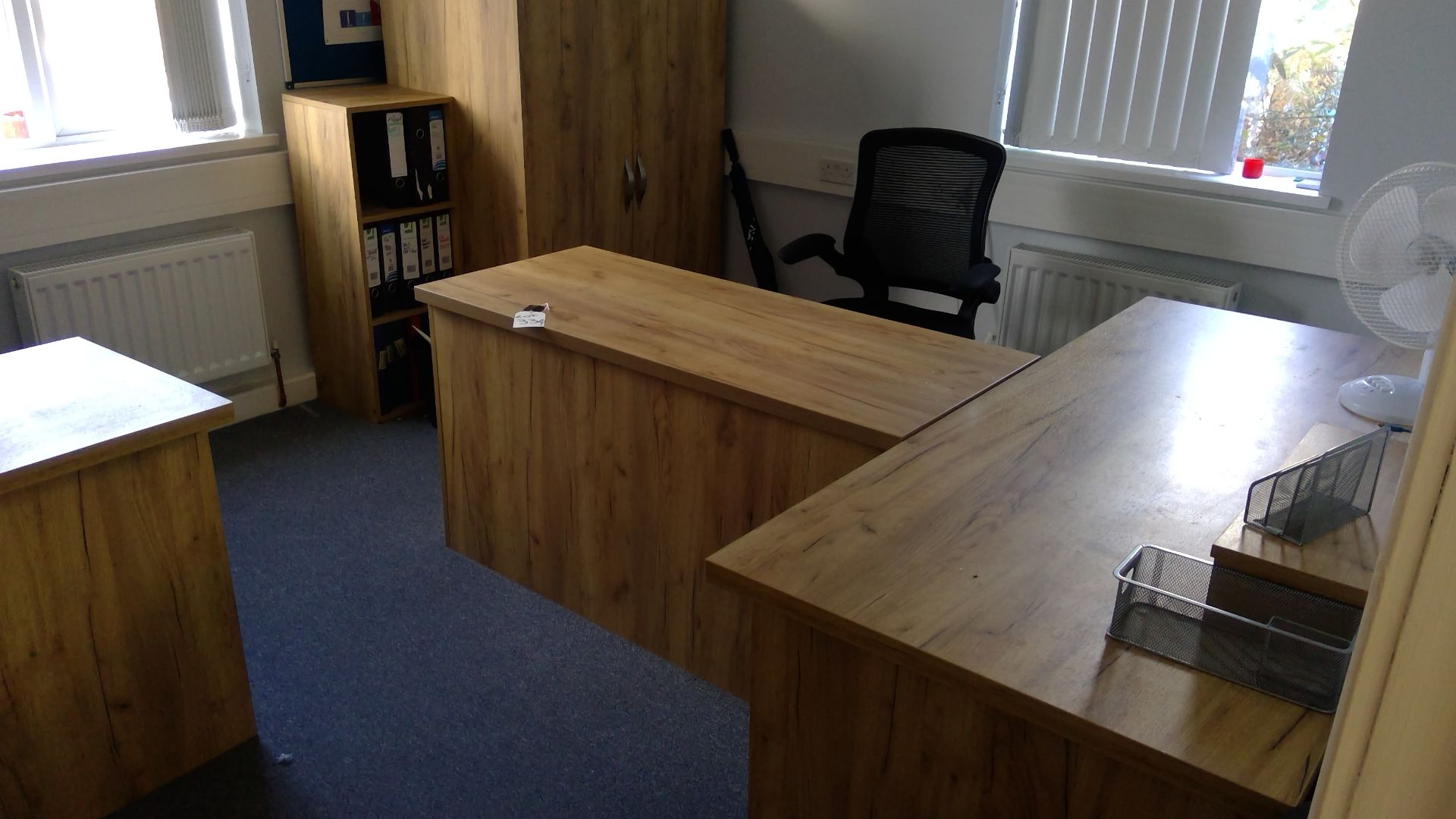 Contents of office 3 to include oak effect executive desk with return, single pedestal desk, 2 bookc