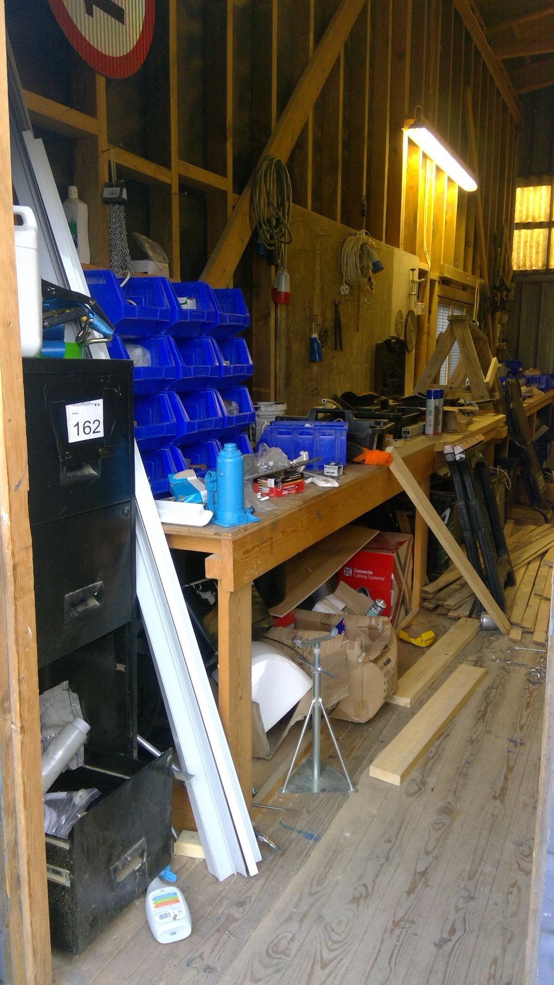 Contents of workshop to include timber, benches, tools, cable, extractor units and consumables