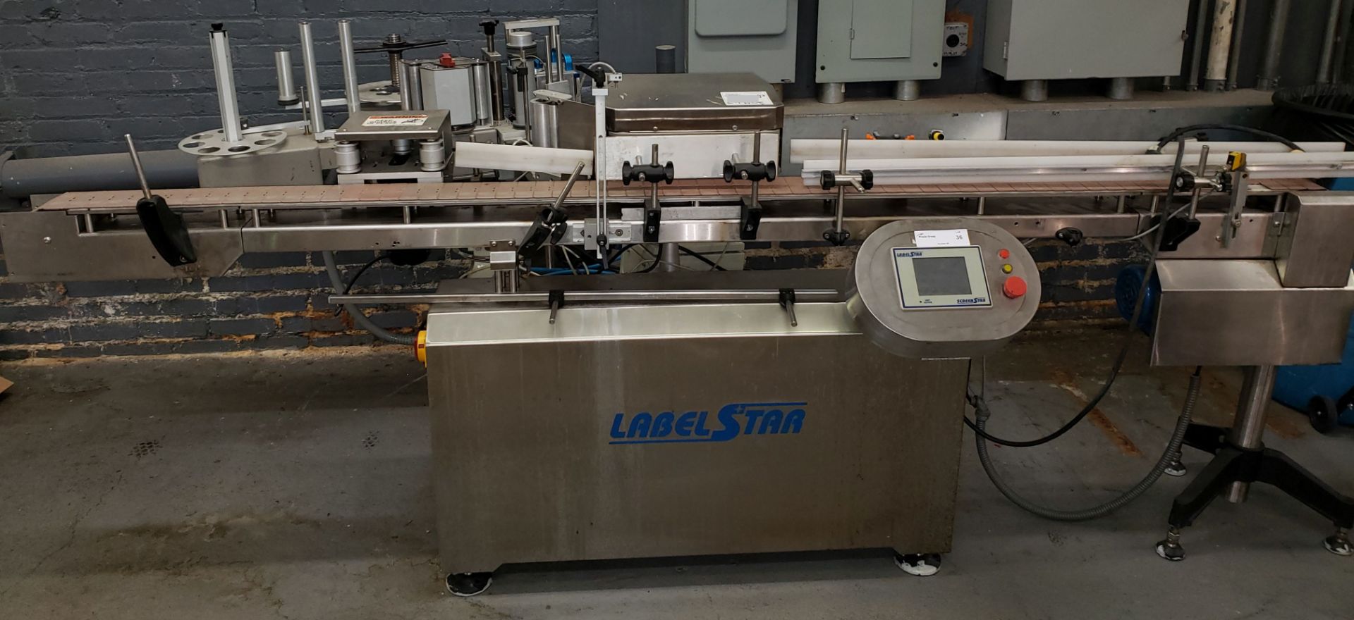 LabelStar pressure sensitive labeler, model LS130DX, 6" max web, with Norwood 53XL40 hot stamp