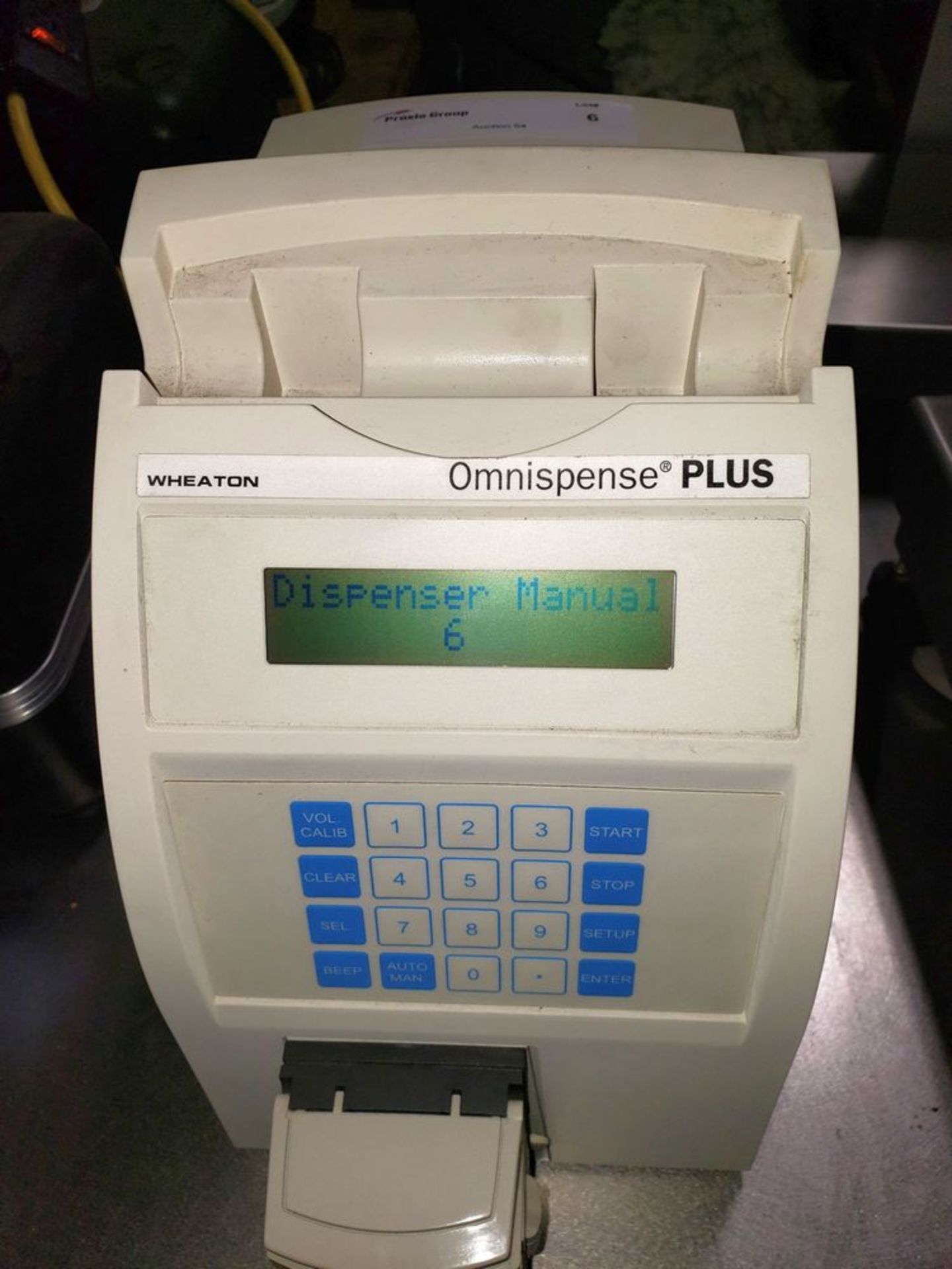 Wheaton Omnispence Plus, with integrated peristaltic pump, semi-automatic operation.