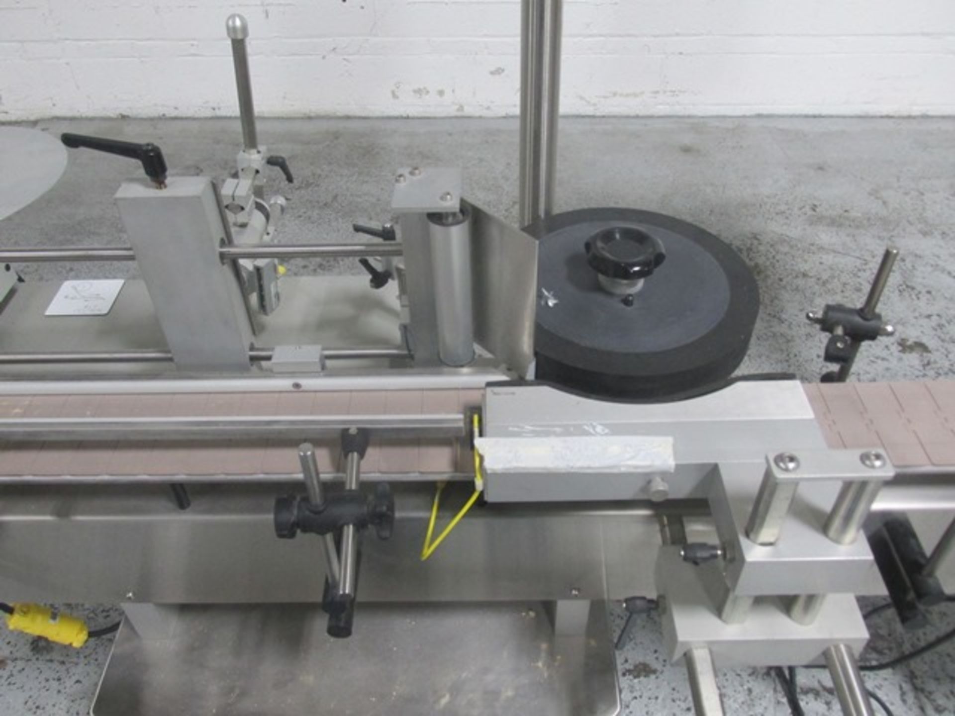 Used New Jersey wrap around labeler, model UNI300V-S007, with Optel vision system, model Optel - Image 7 of 14