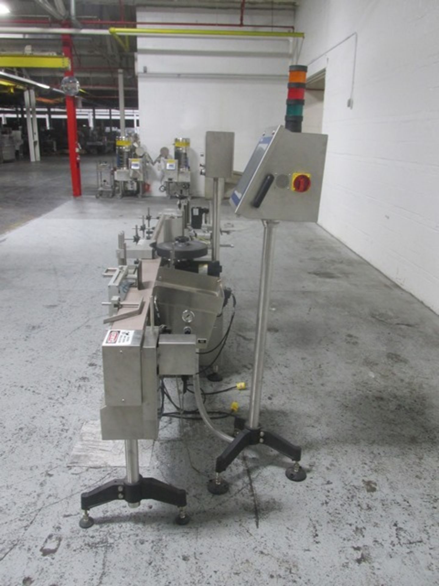 Used New Jersey wrap around labeler, model UNI300V-S007, with Optel vision system, model Optel - Image 2 of 14