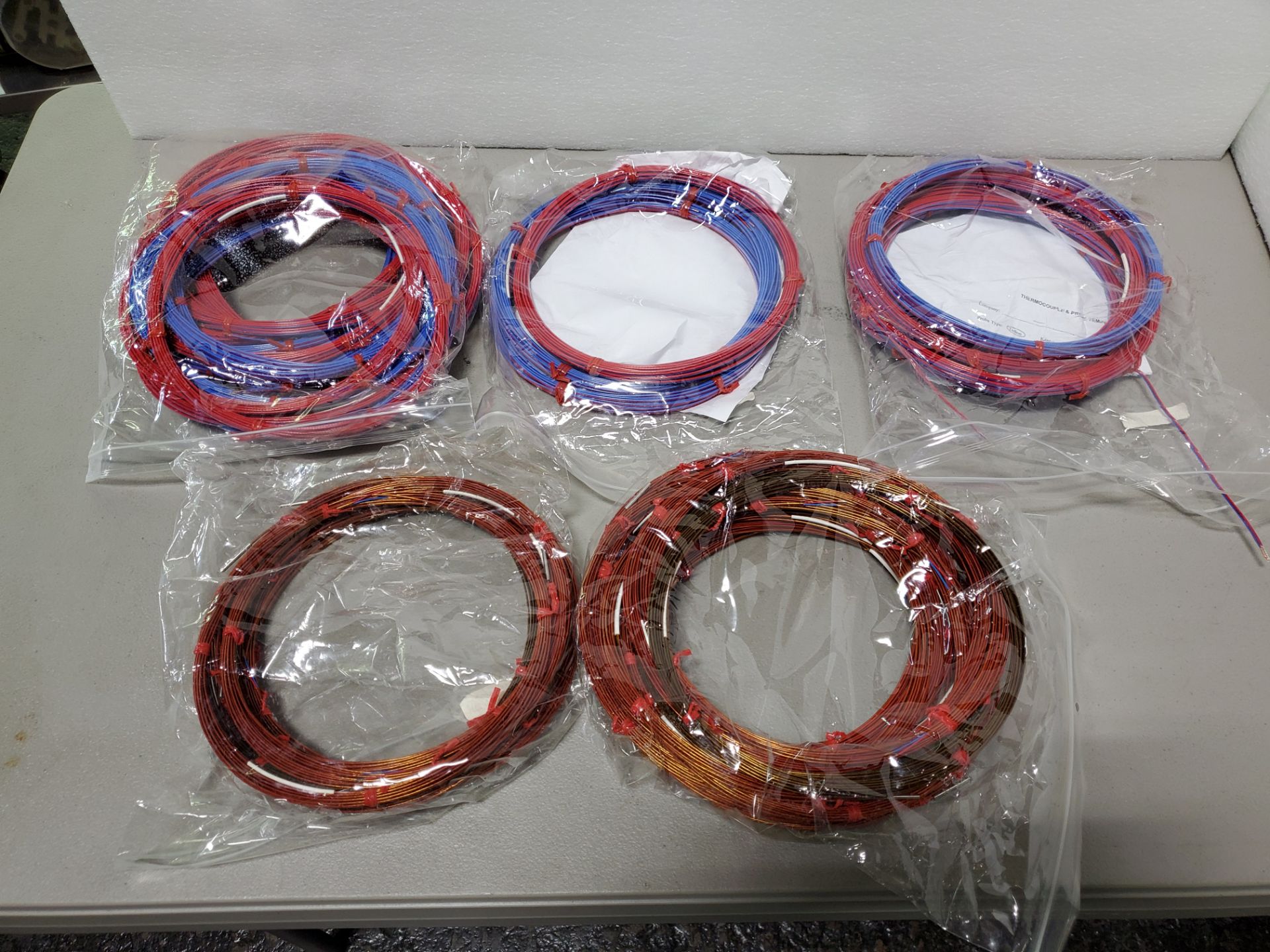 Lot of Kaye Validator wires and thermocouples, unused, both copper and red and blue wires.